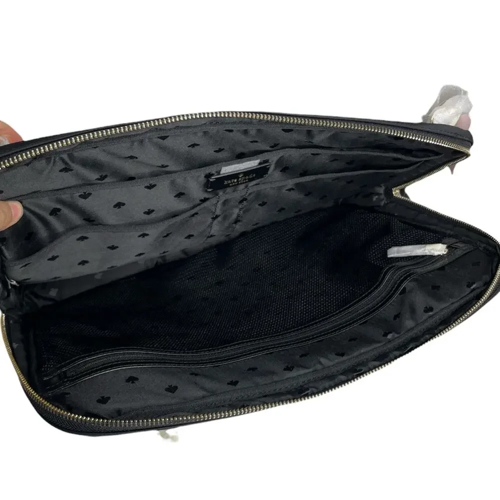Kate Spade chelsea laptop sleeve with strap fits a laptop up to 15